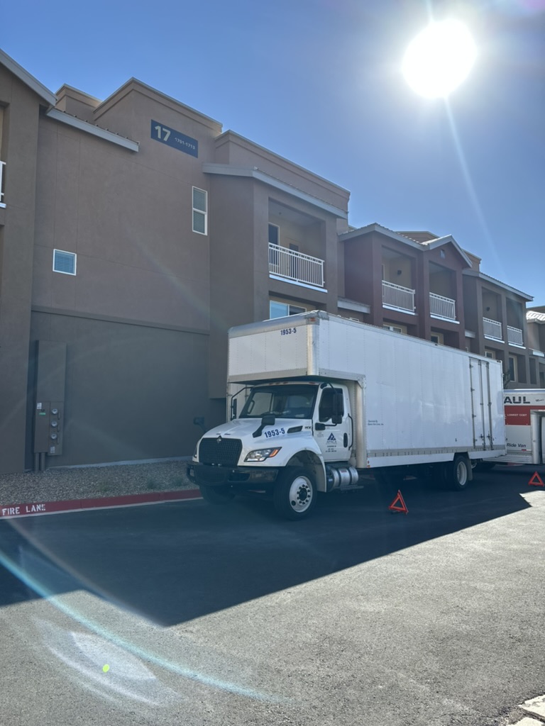 Moving Truck in front of residence completing a move