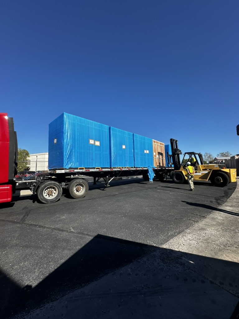 Delivery of high-tech manufacturing machinery.